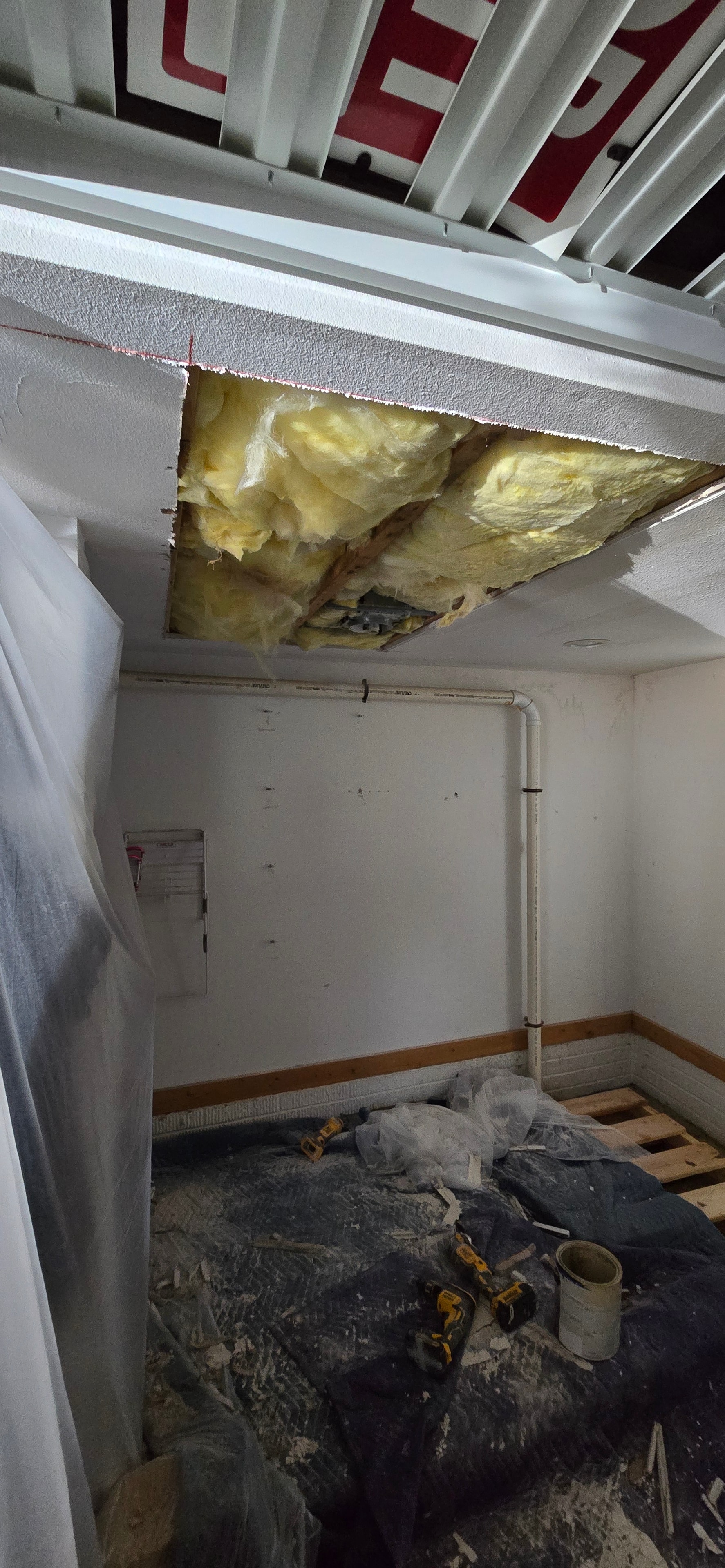 Damaged ceiling with exposed insulation — H&H Construction Services