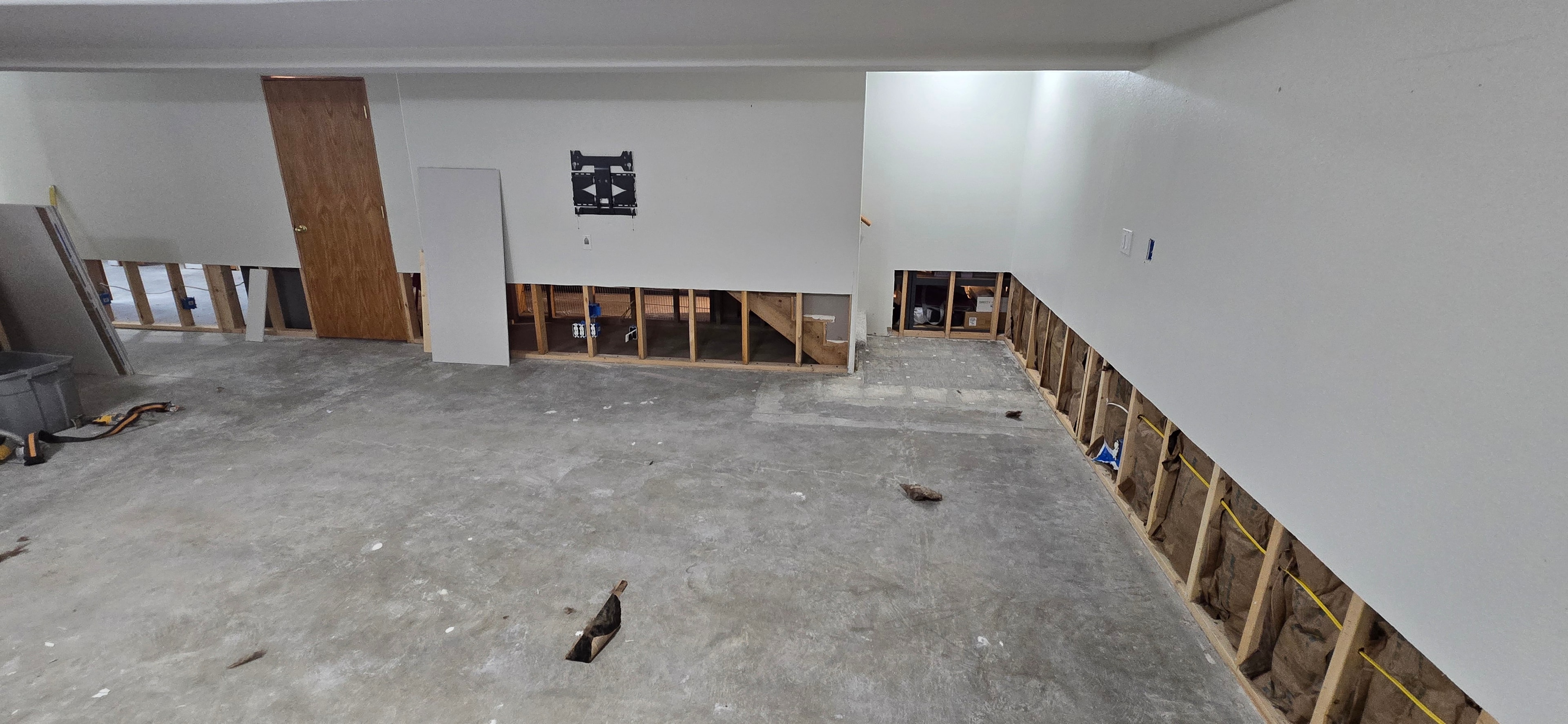 Basement hallway drywall finishing — H&H Construction Services