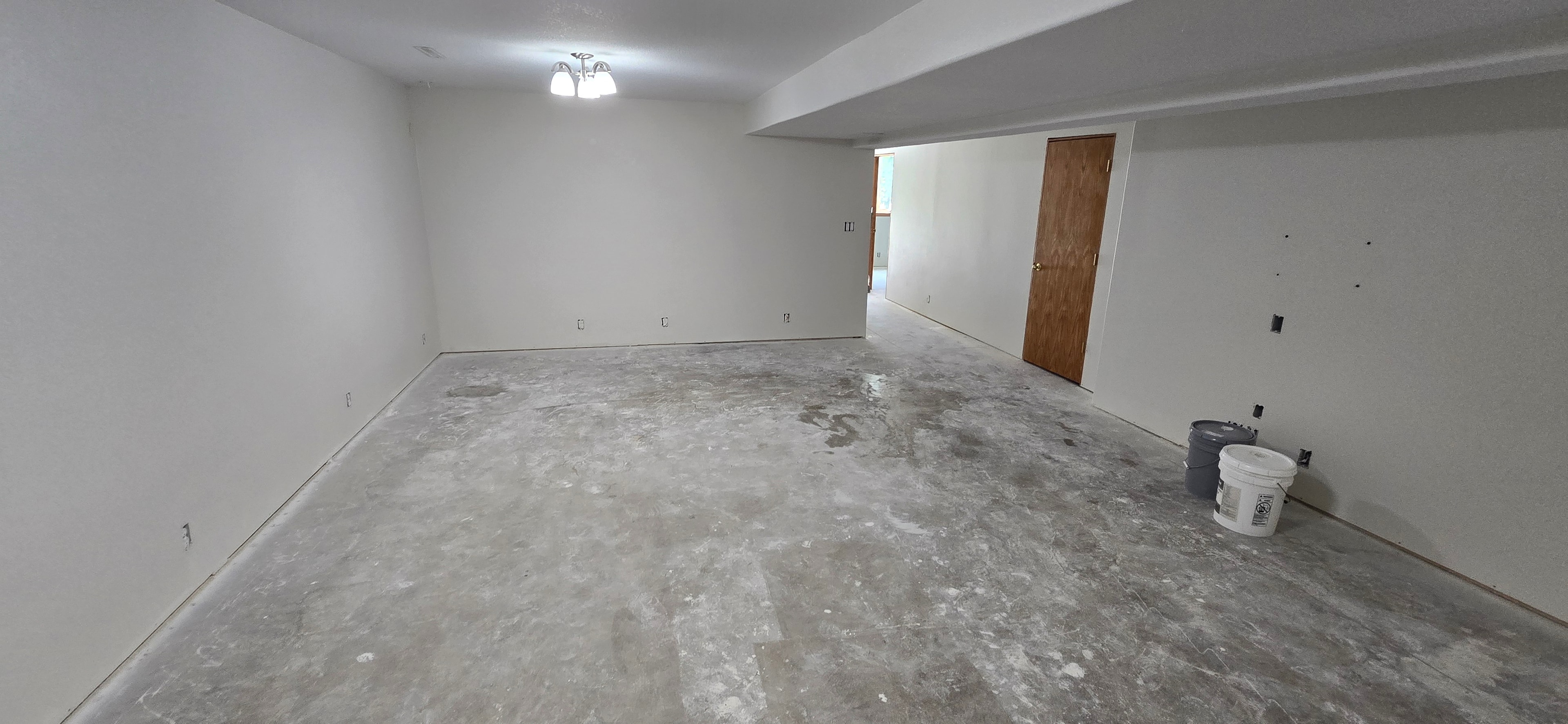 Completed basement main room — H&H Construction Services